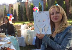 Наталия получила от шаржиста свой рисунок фломастерами